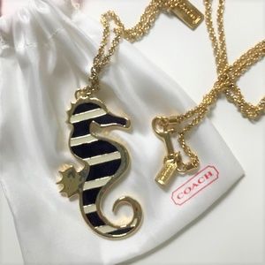 Coach Gold Striped Seahorse Necklace